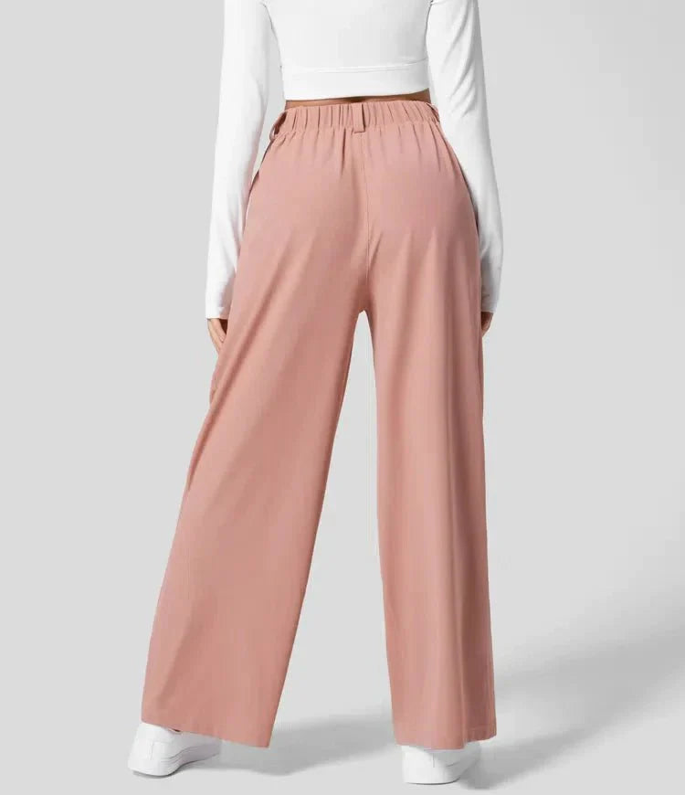 Damenhose mit weitem Bein und Falten sowie elastischem Bund